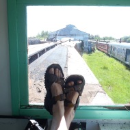 Fulfilling a childhood ambition to sit in the observation platform of a caboose.
